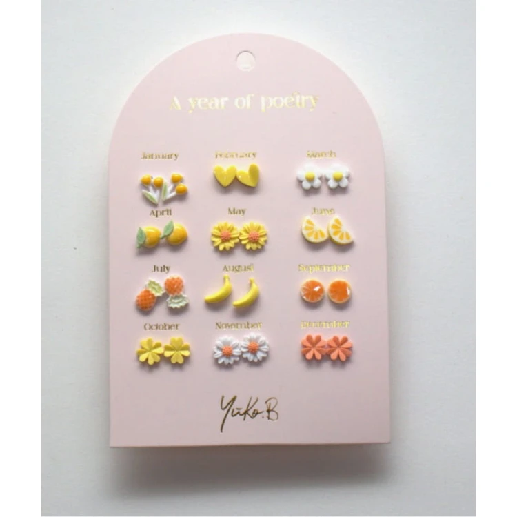 kolczyki-rok-poezji-zolte-wersja-angielska (1).jpg