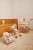 liewood-wozek-spacerowka-elsie-LW19756-peach-sea-shell_Doll_Stroller_LW19756_1232_Peach_Sea_shell_1-3.webp