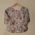 mushie-sliniak-z-dlugim-rekawem-retro-flowers (3).webp